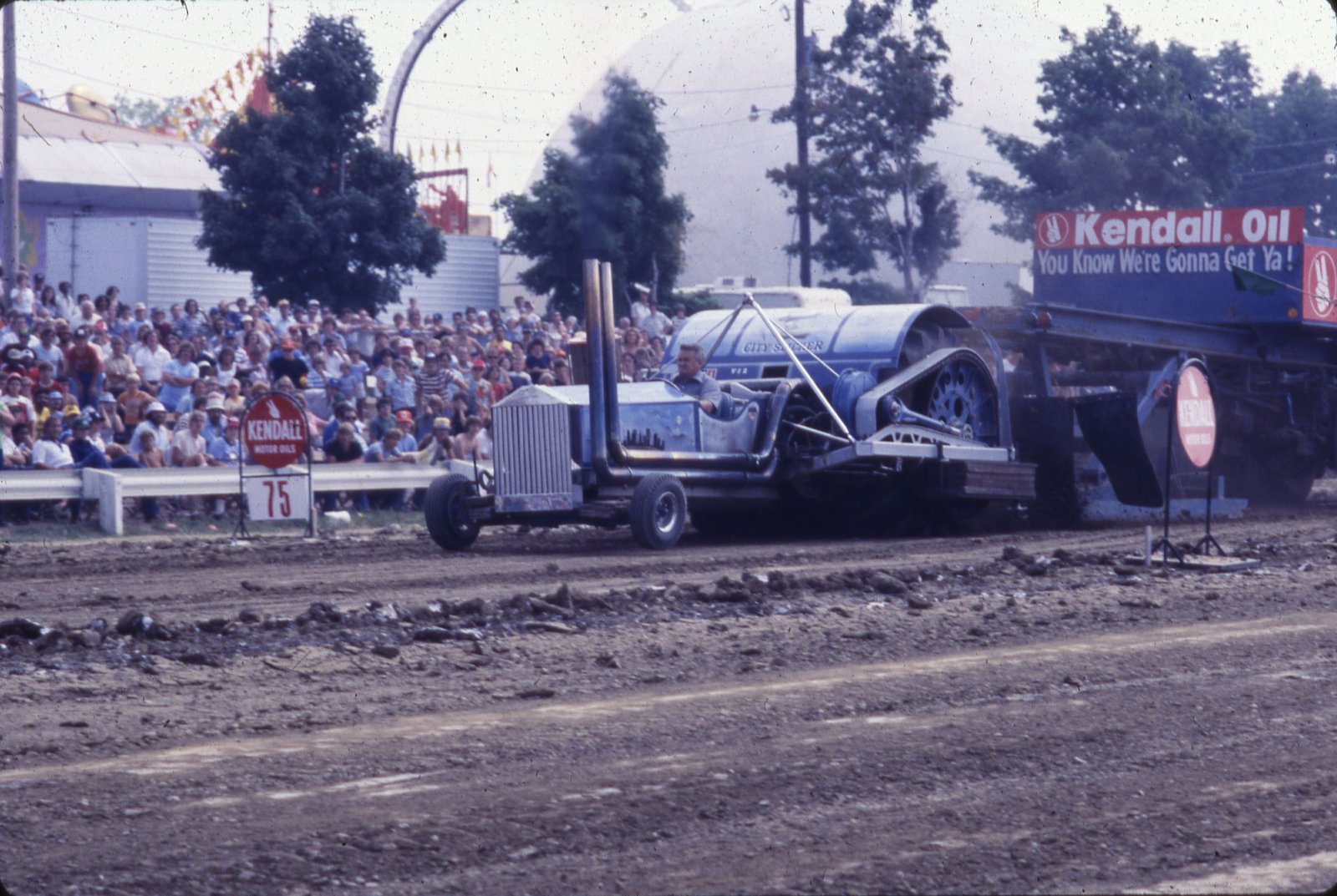 Crowd watches a tractor pull at the Ohio State Fair